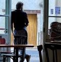 La silhouette de Pierre Jancou dans son habit de restaurateur au Café des Sports, de Padern, dans un village des Hautes Corbières.